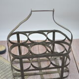 Old metal bottle holder