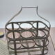 Old metal bottle holder