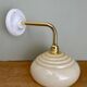 Vintage angled wall lamp with pale yellow opaline shade
