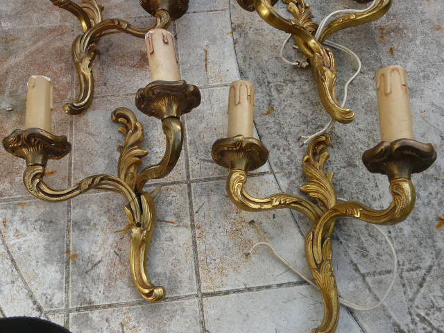 Two pairs of bronze wall lamps