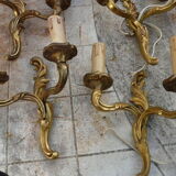 Deux paires d’appliques en bronze