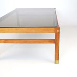 Table basse en palissandre et verre fumé