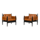 Paire de fauteuils lounge « safari » en cuir cognac et hêtre noir — c. 1970