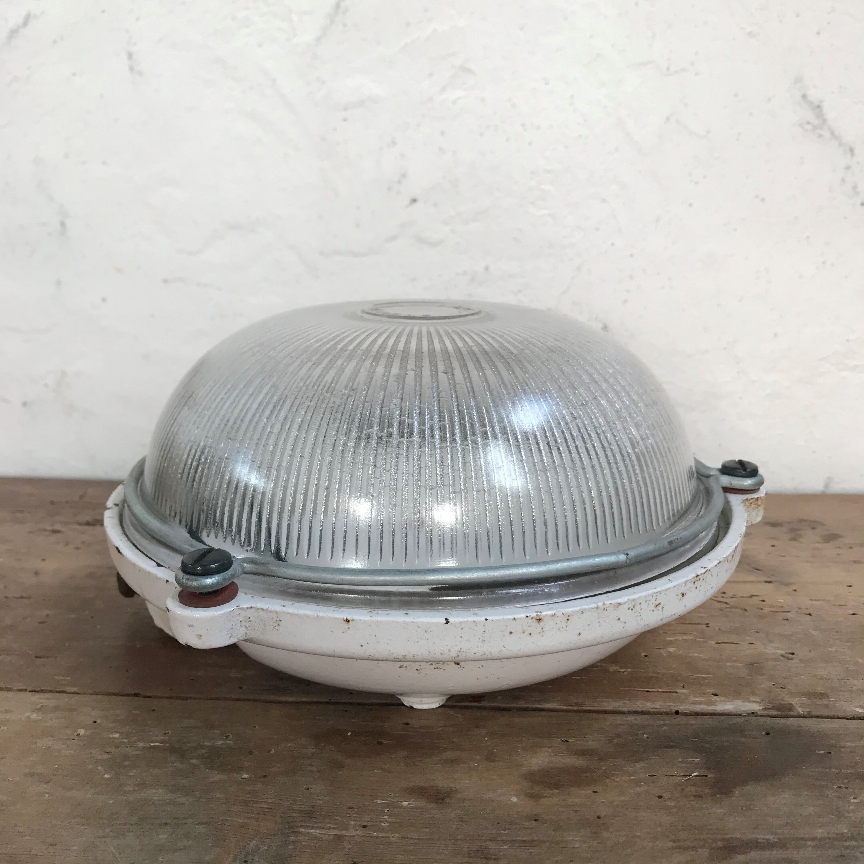 Cast window and holophane glass applied