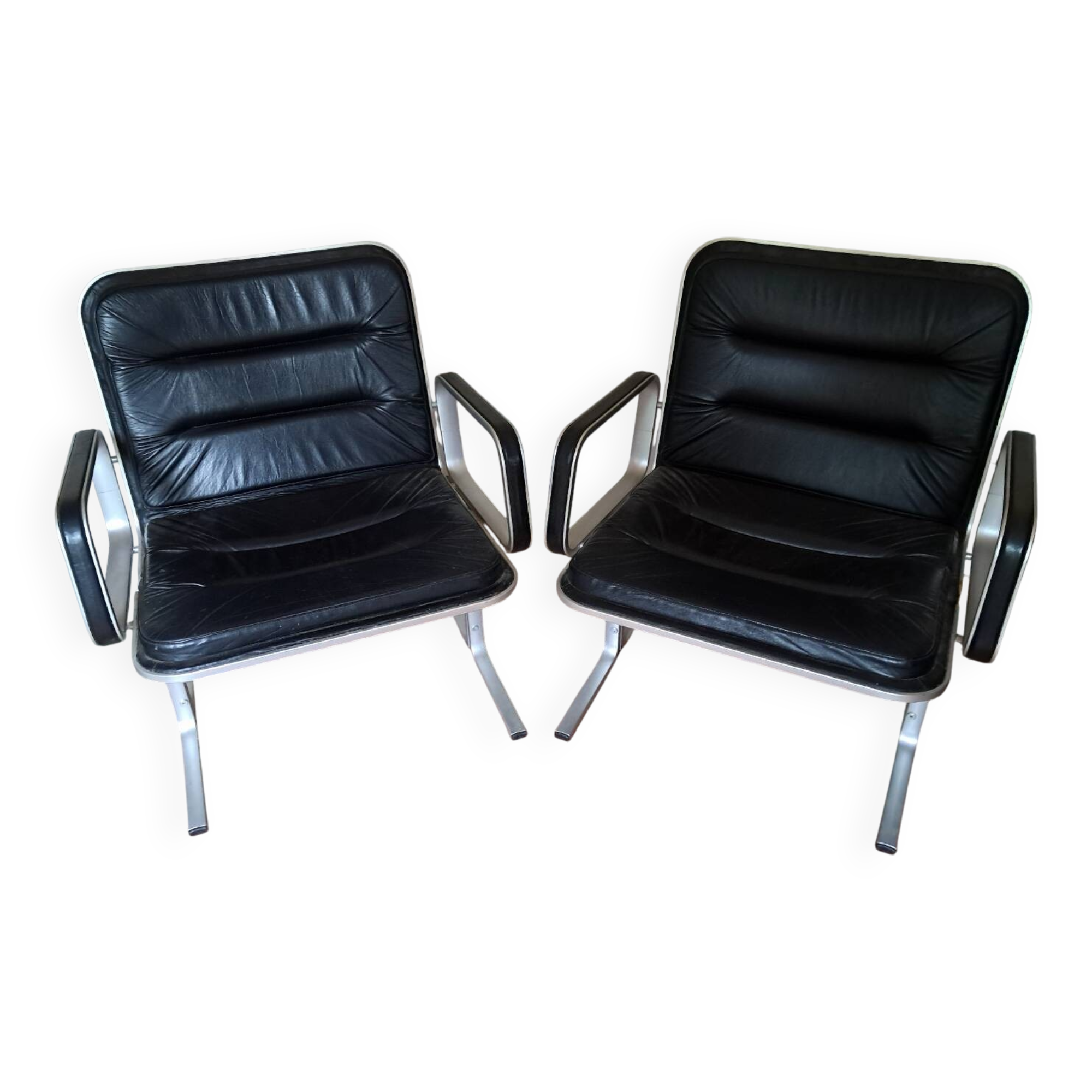 Pair of leather and aluminum armchairs