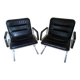Pair of leather and aluminum armchairs