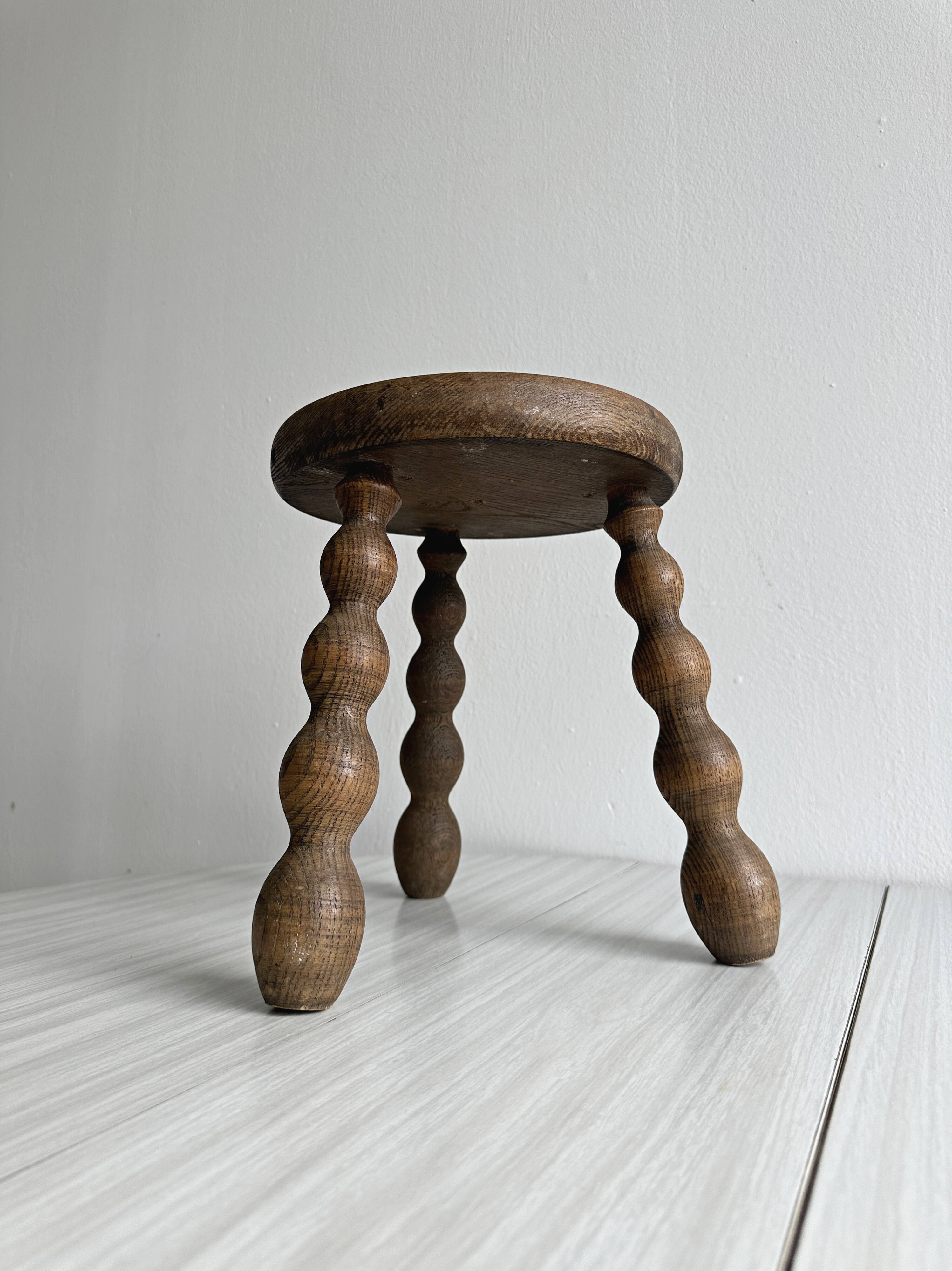 Antique wooden tripod stool