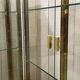 Pair of display cases in gilded chrome and smoked glass - 1980s