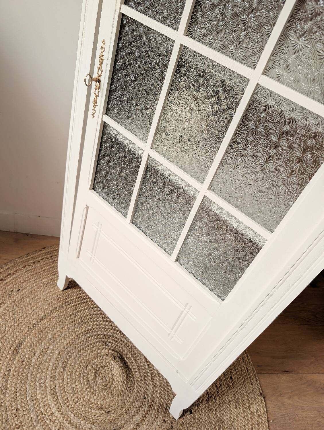 Renovated glass Parisian bonnet maker