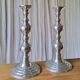Pair of antique chrome metal candlesticks