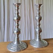 Pair of antique chrome metal candlesticks