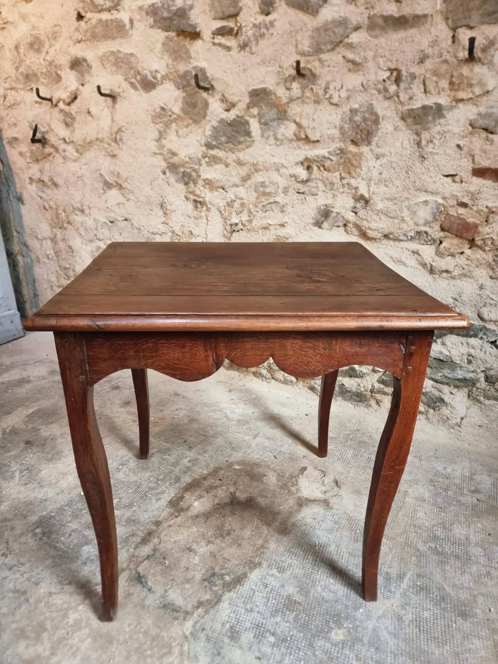 Antique oak side table, provincial writing table from the 18th century, Louis XV style.