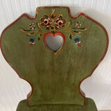 Wooden dressing table with olive green chair and floral patterns