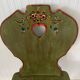 Wooden dressing table with olive green chair and floral patterns