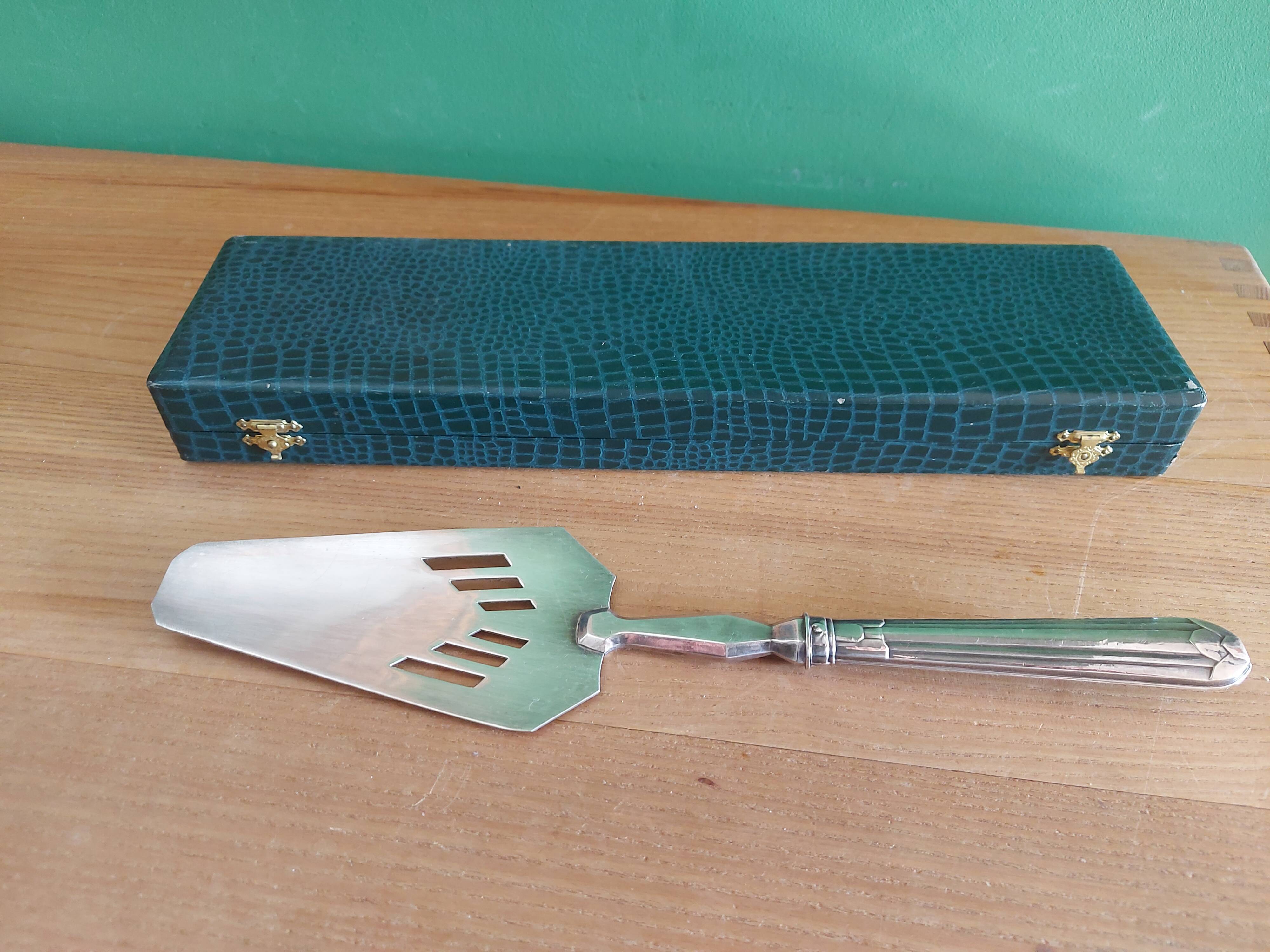 Filled silver shovel , art deco