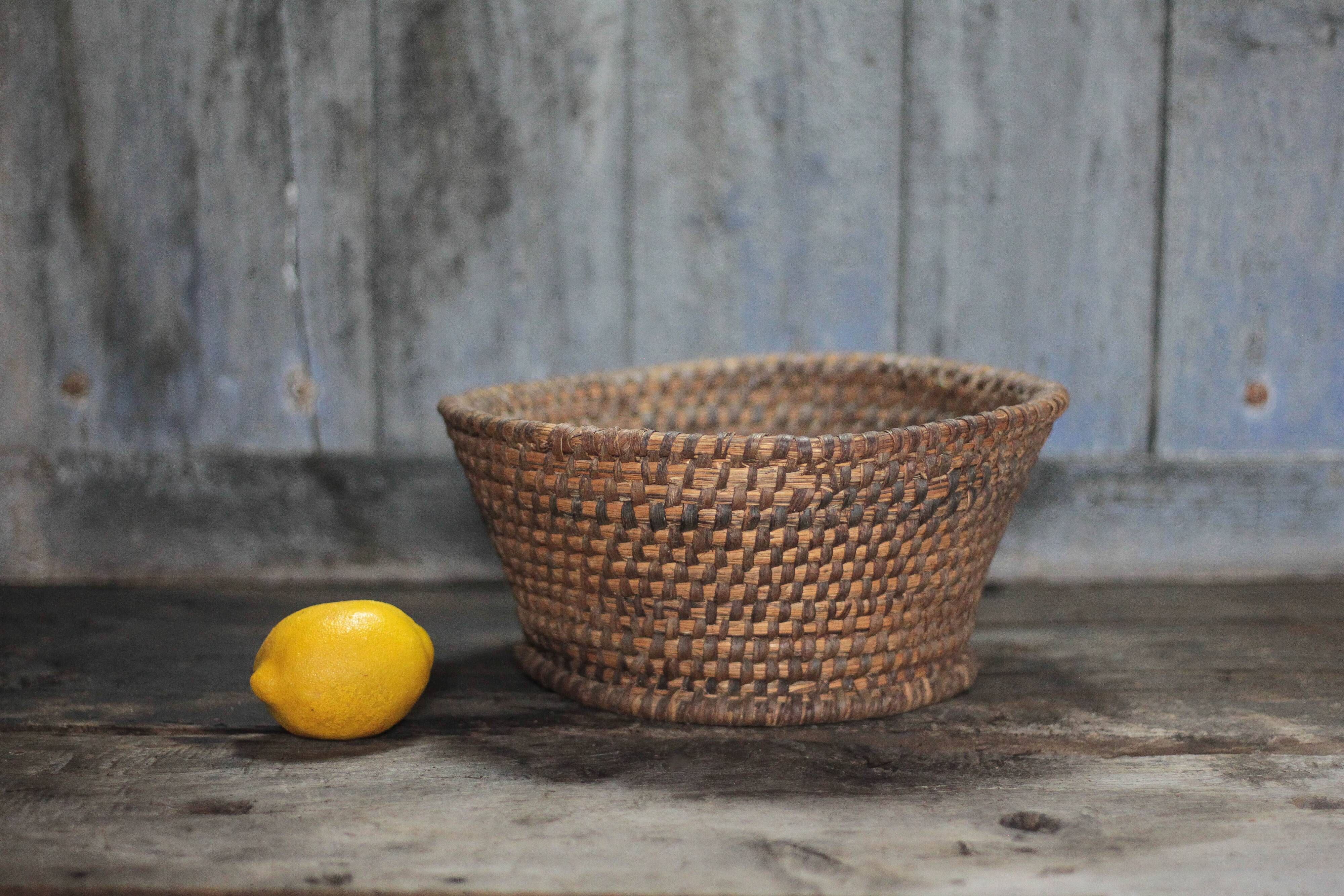 Old wicker basket, straw and bramble, woven basket, countryside, chal.