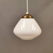 Beautiful ball-shaped hanging lamp in white opal glass with brass top.