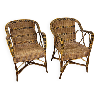 Pair of vinyl rattan armchairs