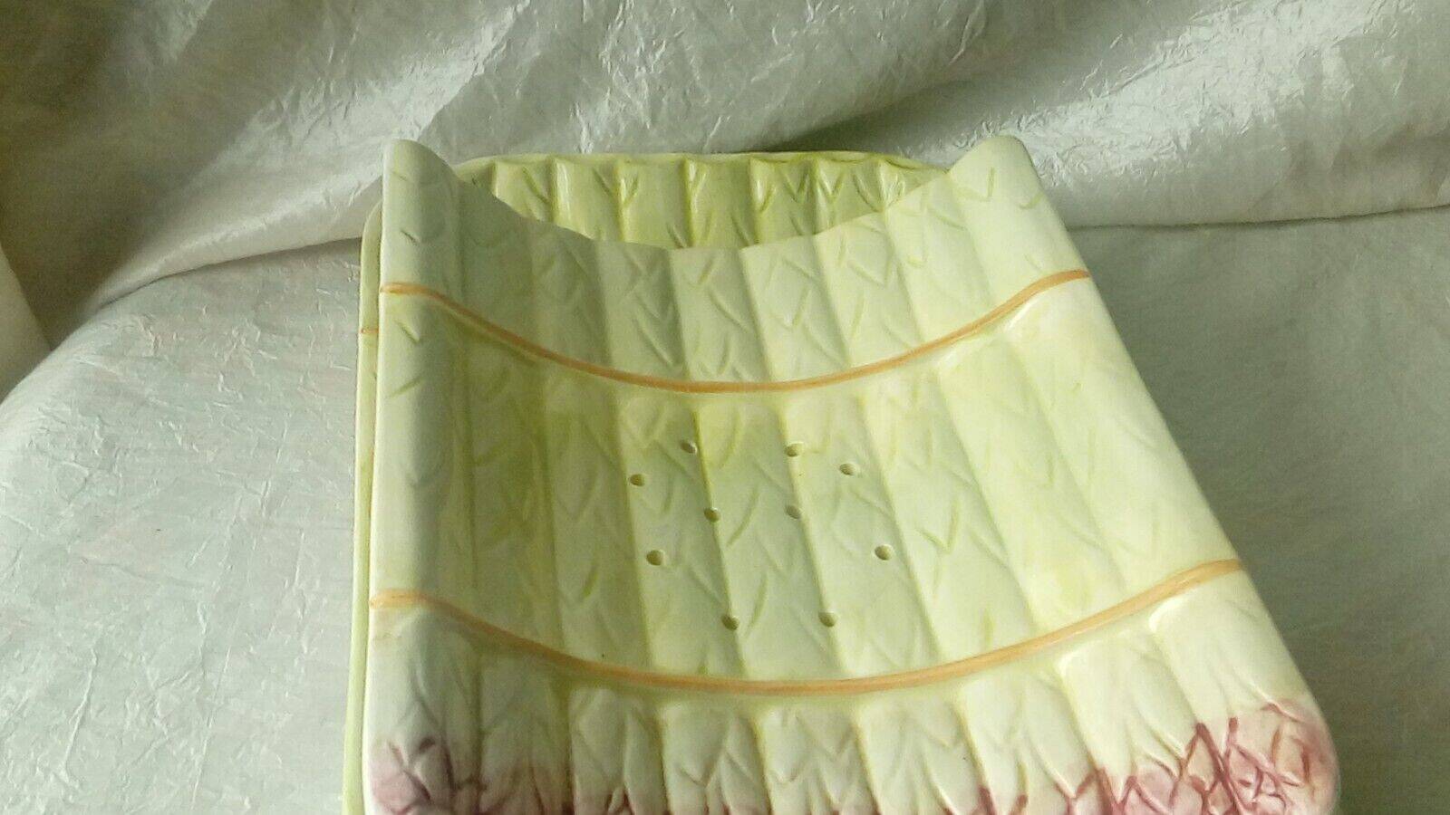 Asparagus dish in slip drainer 20th