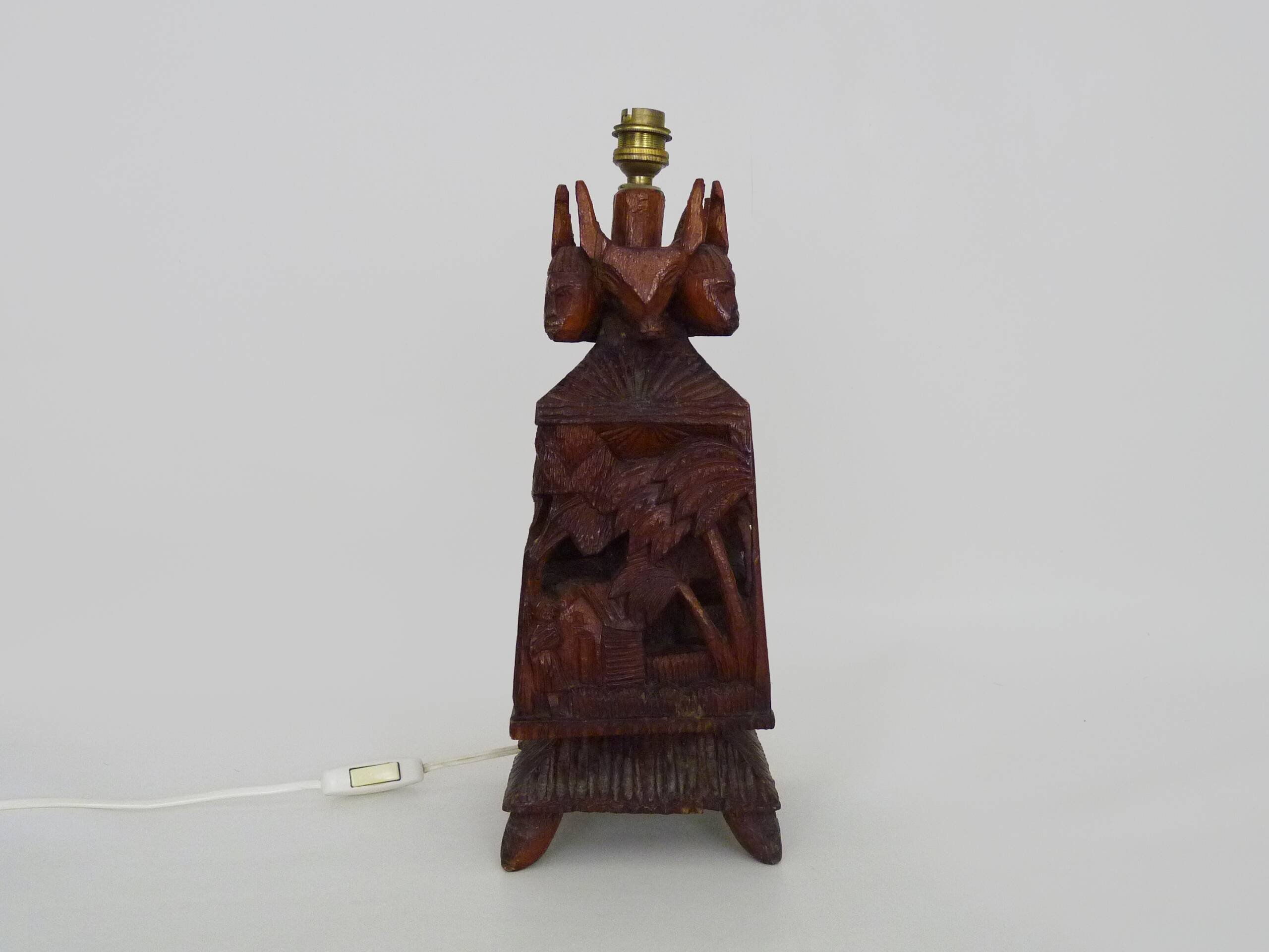 Old large lamp from Malagasy School and Tananarive in carved wood. Art Deco.