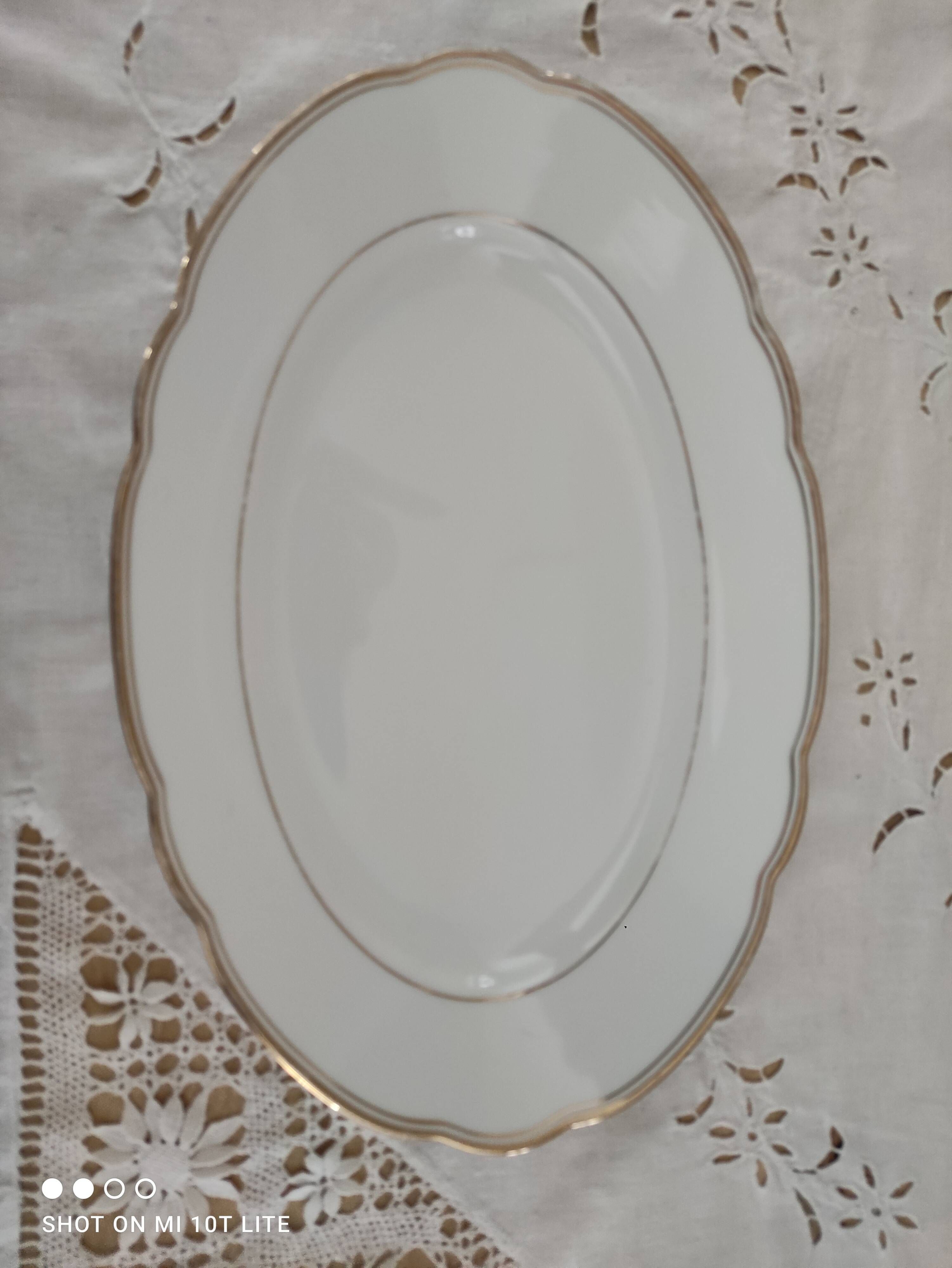 Oval plate in white Swiss porcelain double gilded border "VSK USC Viribus Unitis"
