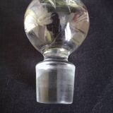 Wine carafe on foot, in cut and enameled glass