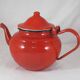 Vintage teapot coffee maker in red enameled metal
