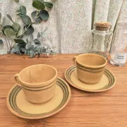 Two vintage Sarreguemines stoneware breakfast cups.