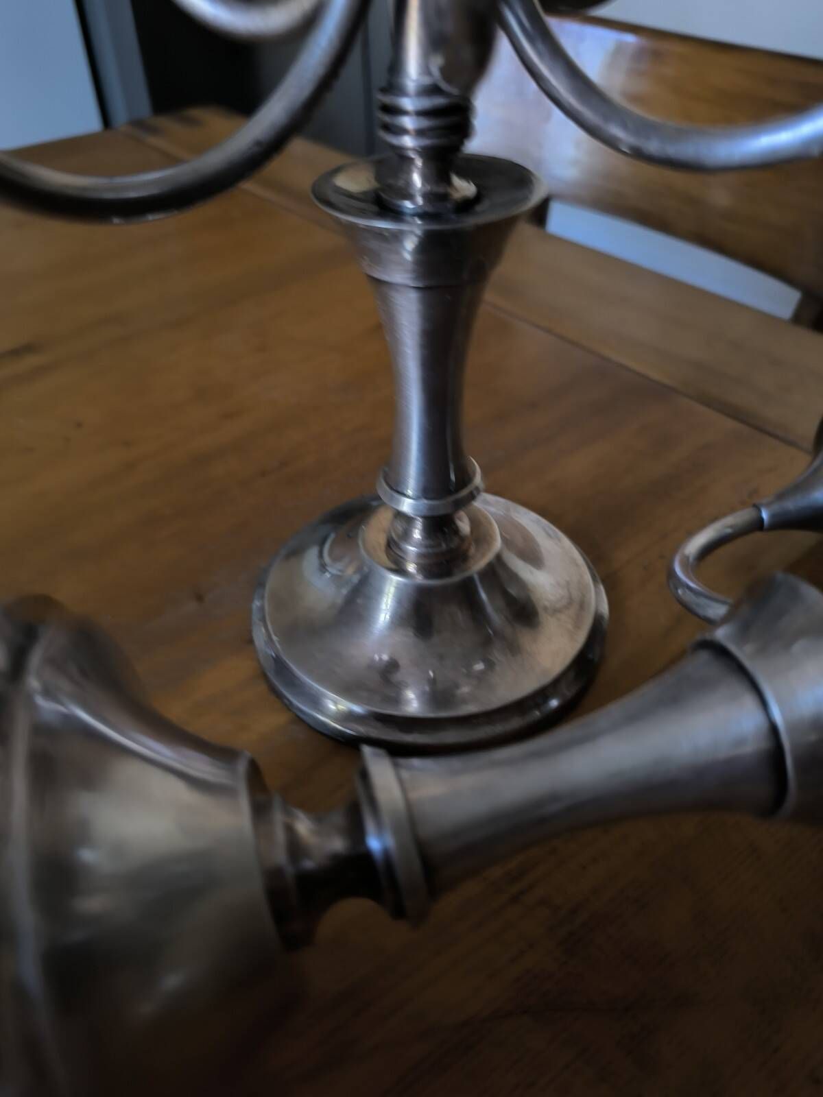 Ercuis pair of candlesticks model Cheverny in silver-plated metal with hunting horn decoration.