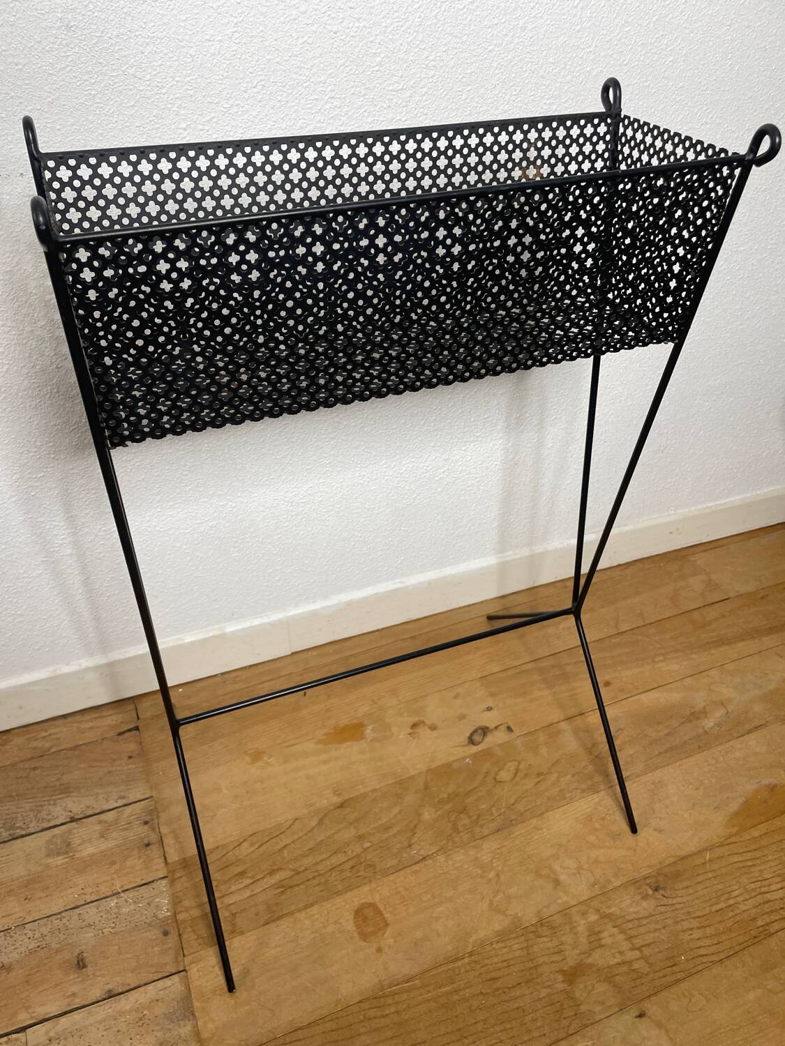 1950s black perforated metal planter in the style of Mathieu MATEGOT
