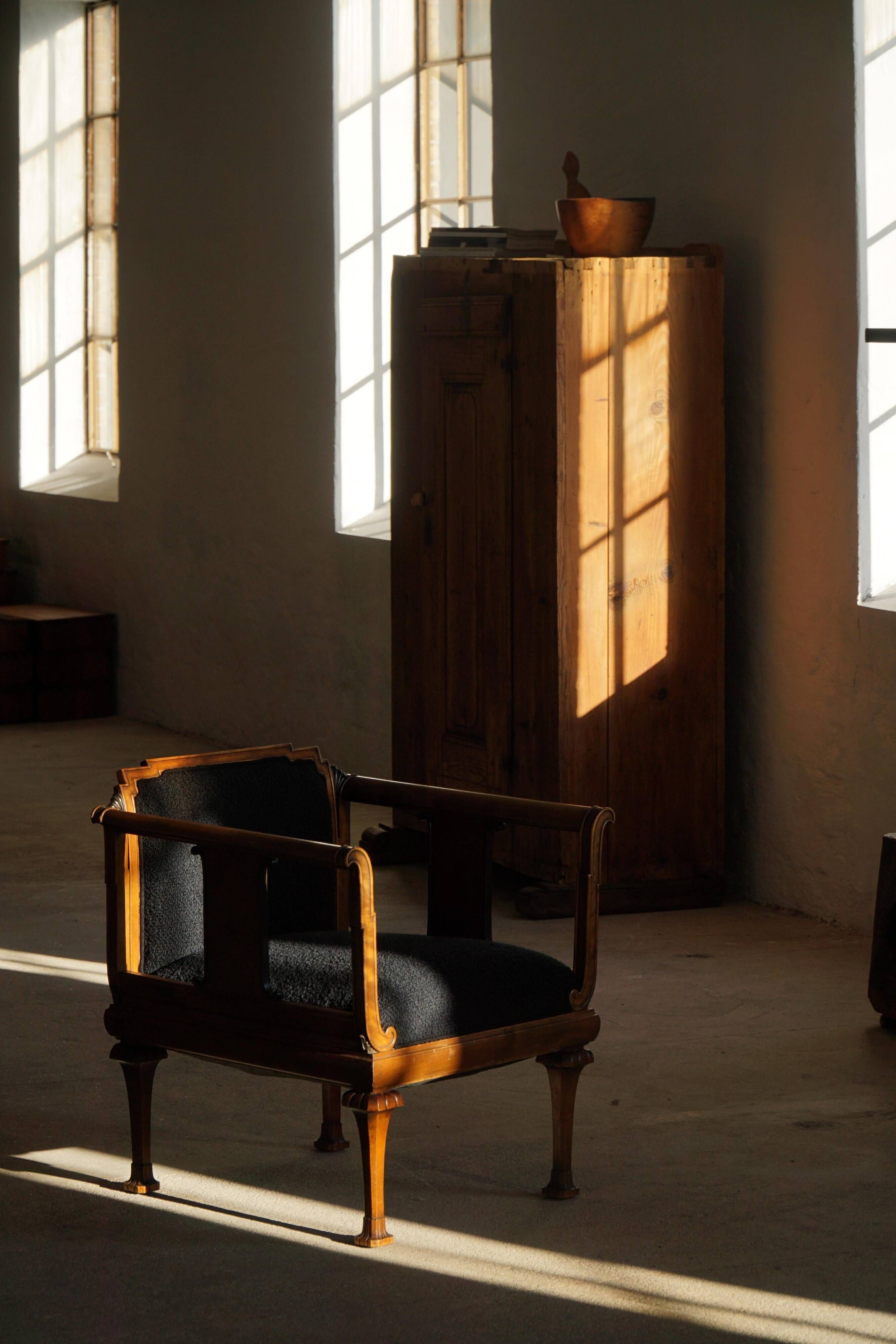 Early 20th century Danish Art Nouveau armchair, reupholstered in charcoal boucle.