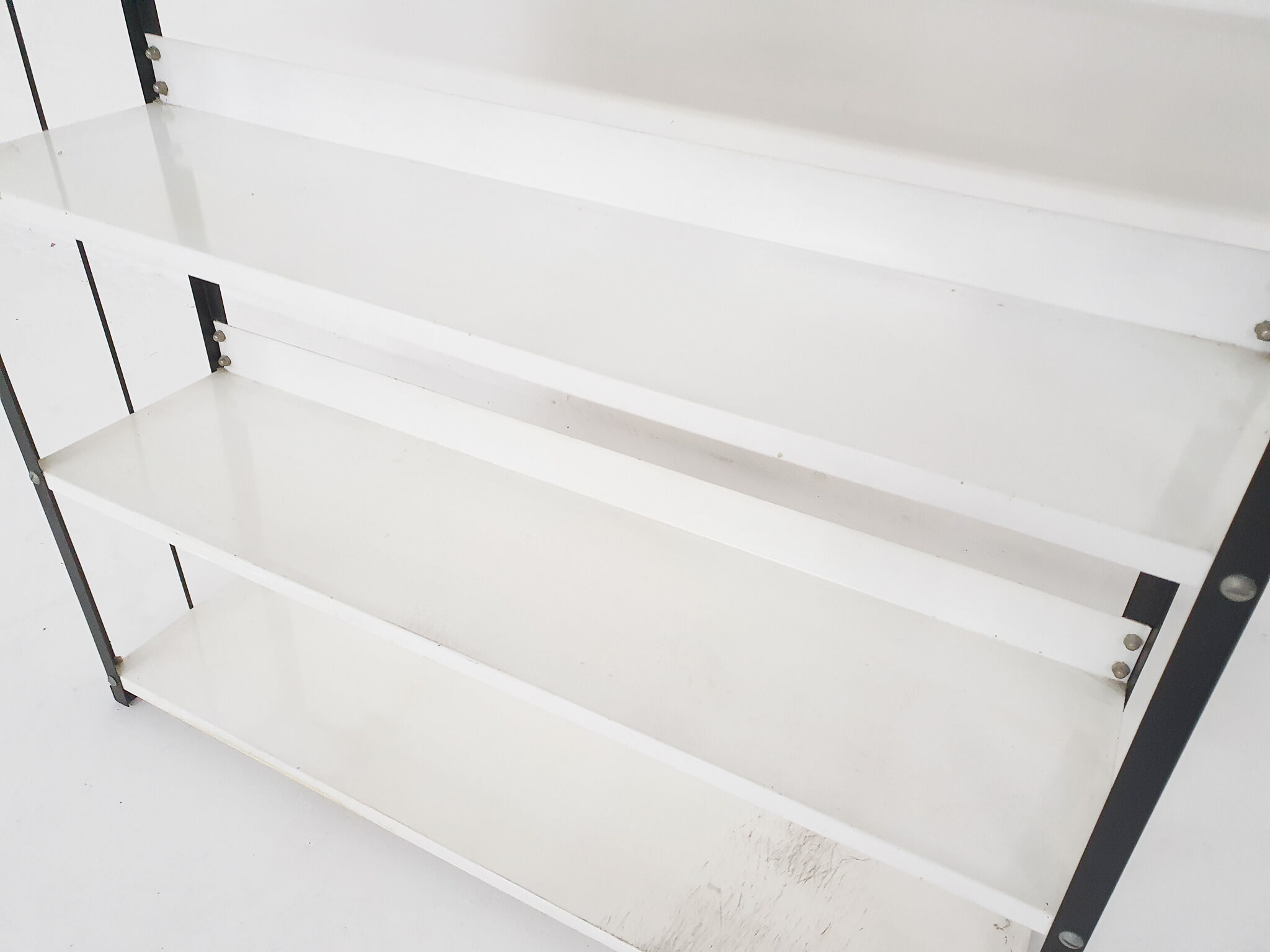 Black and white metal book shelves attrb. to Tomado, Holland, 1950's