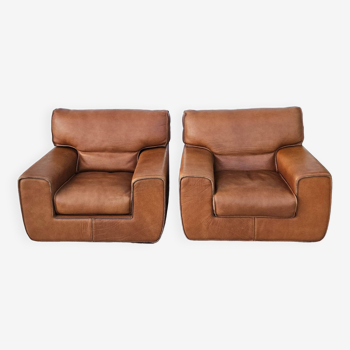 Paire de fauteuils cuir vintage style club signés roche bobois