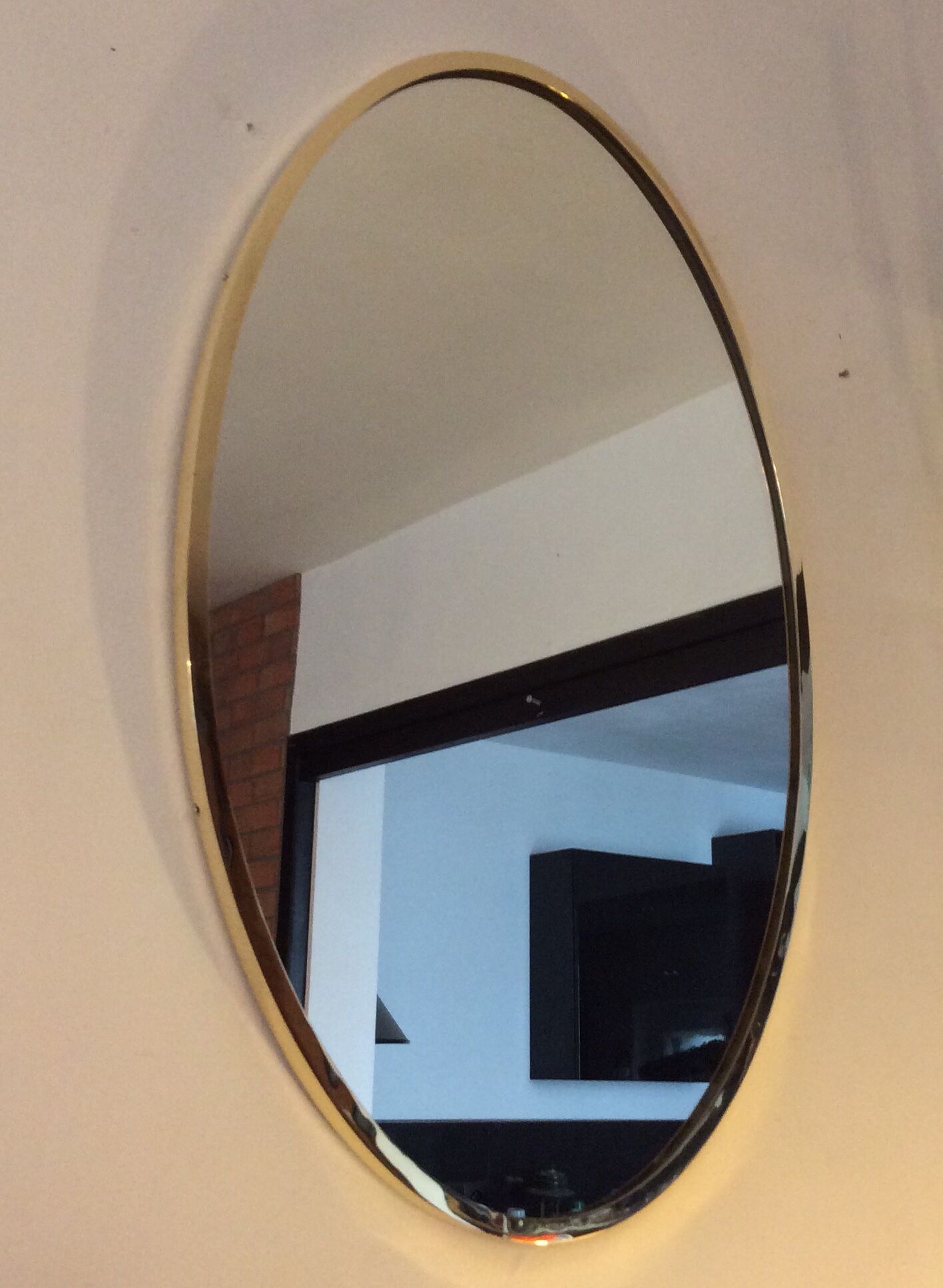 Belgo Chrom oval mirror from the 70s in solid brass
