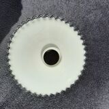 Serrated opaline suspension