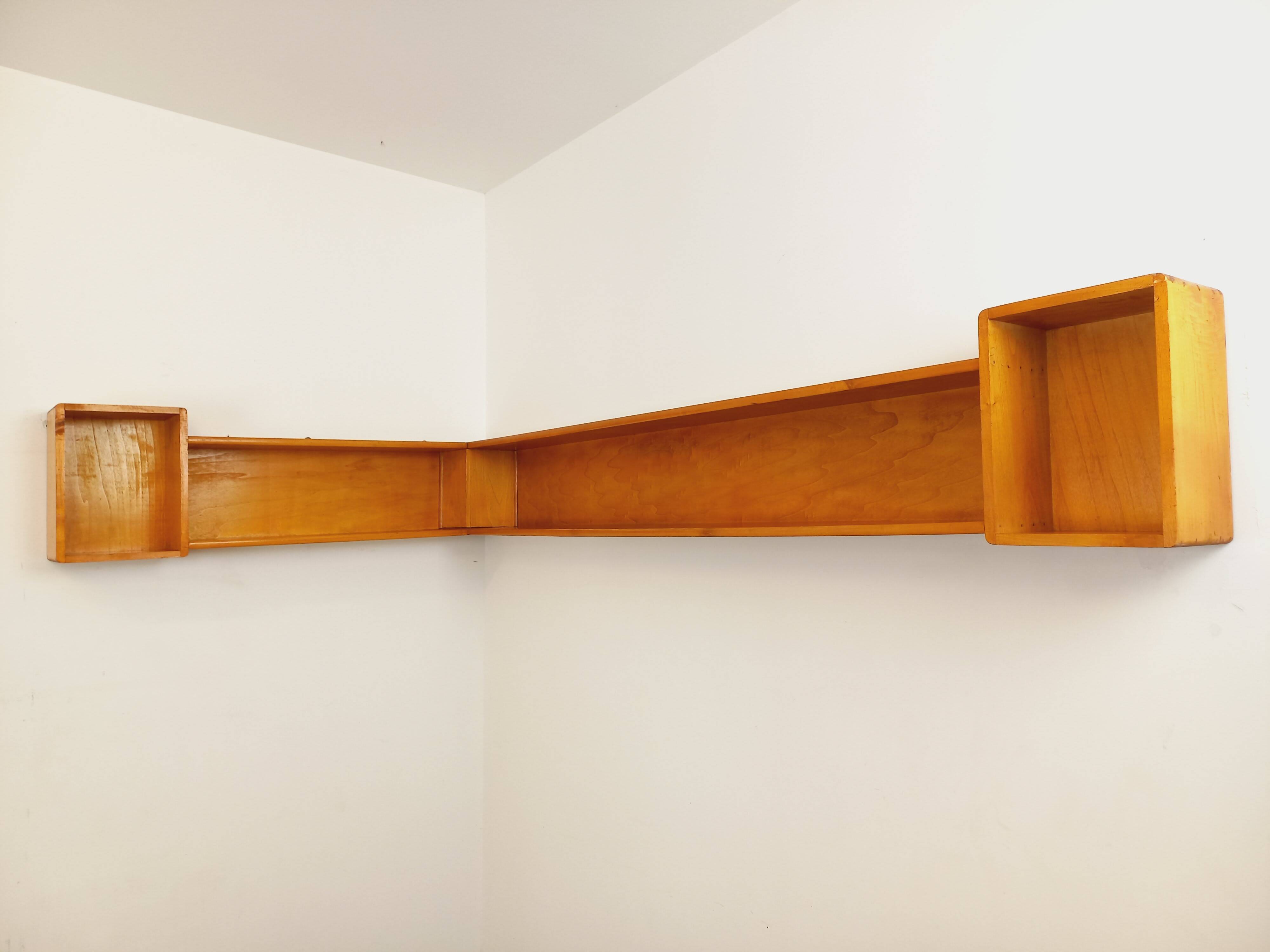 Vintage wooden corner wall shelf from the 60s 70s.