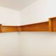 Vintage wooden corner wall shelf from the 60s 70s.