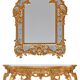 Console with a gilded wooden mirror.