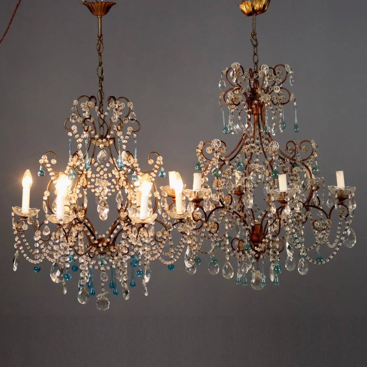 Pair of antique chandeliers in burnished iron and glass, 6 lights, Italy, 19th century.