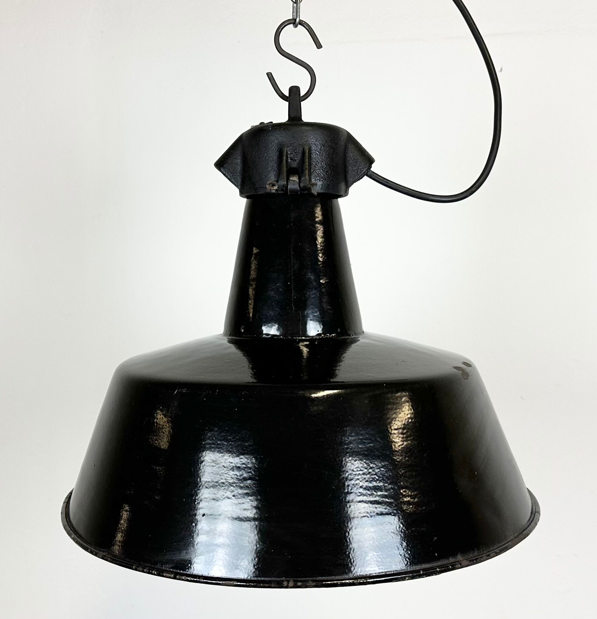 Industrial black enamel factory lamp with cast iron top, 1960s
