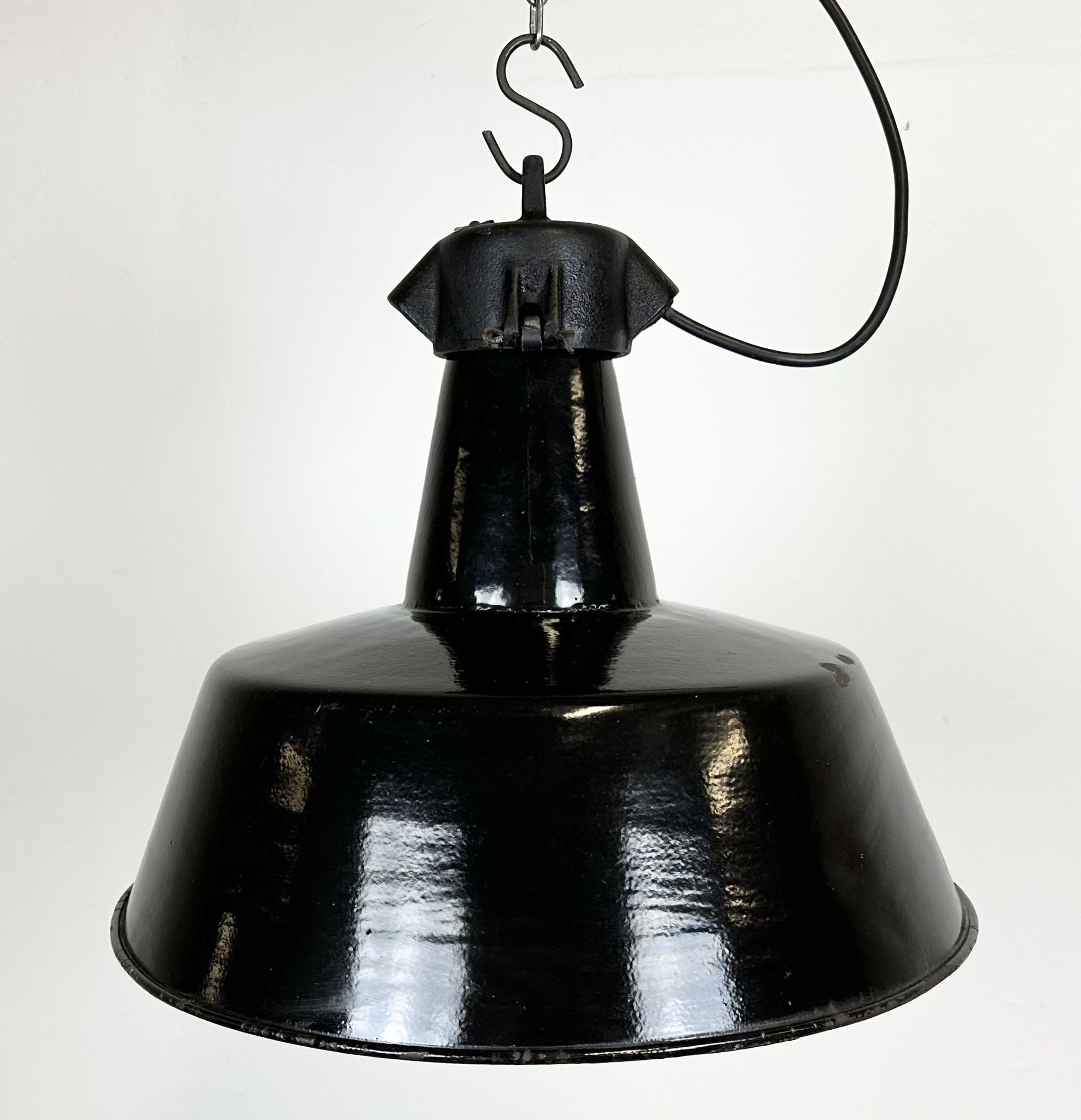 Industrial black enamel factory lamp with cast iron top, 1960s