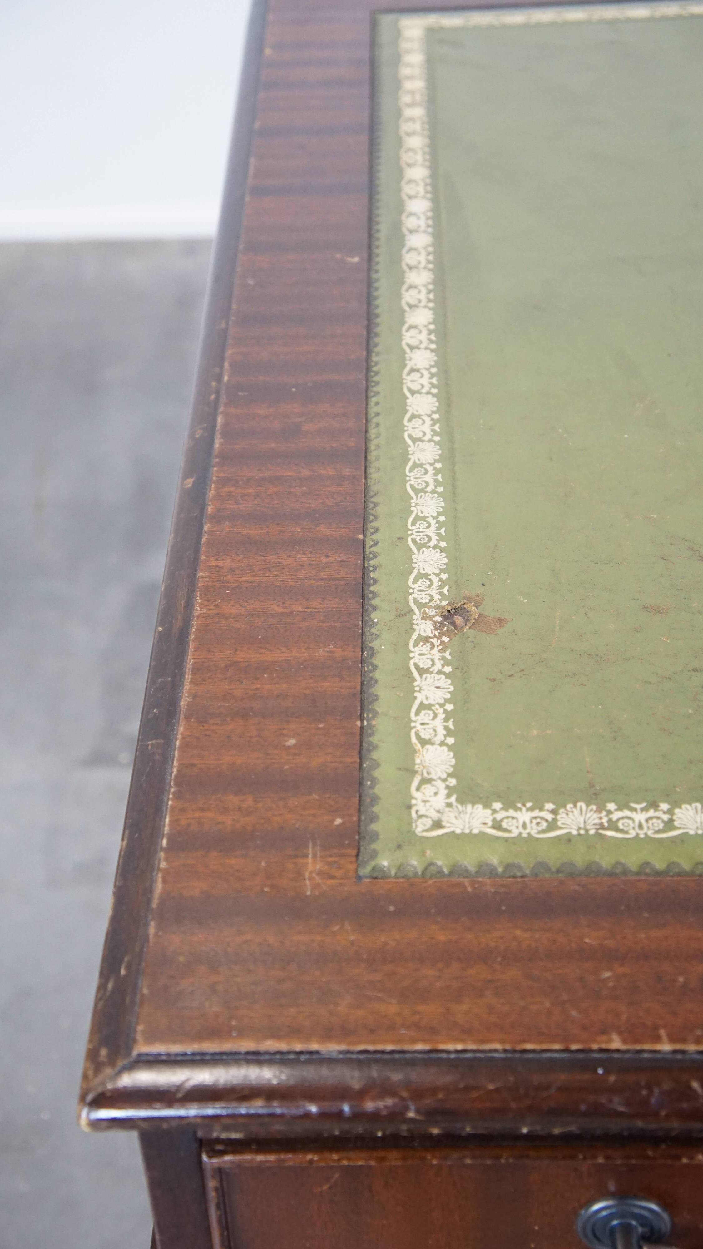 English style chesterfield desk with patina and a green leather top