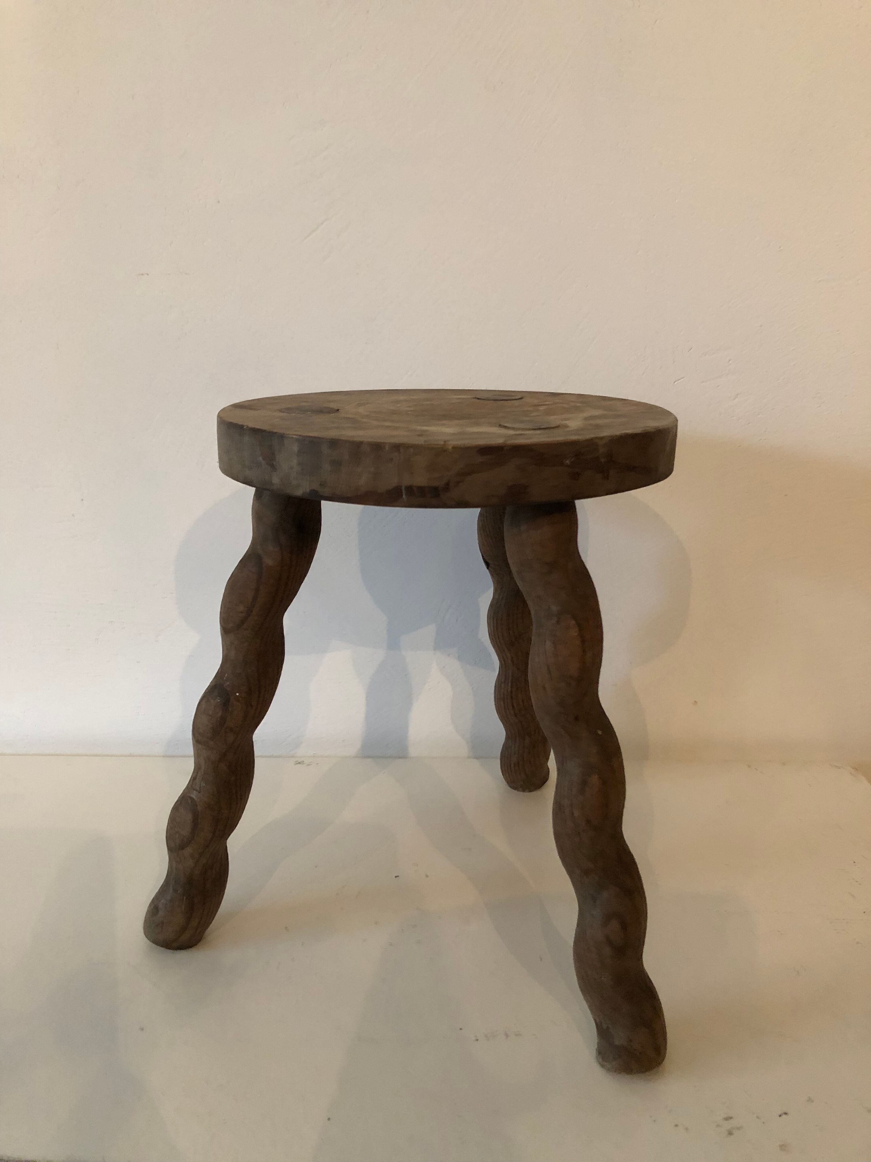 Former tripod stool