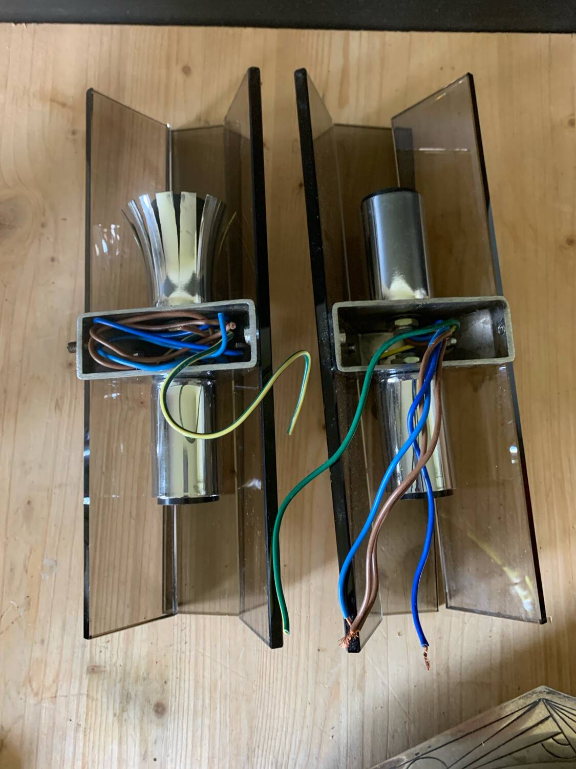 Pair of 70s smoked glass wall lights