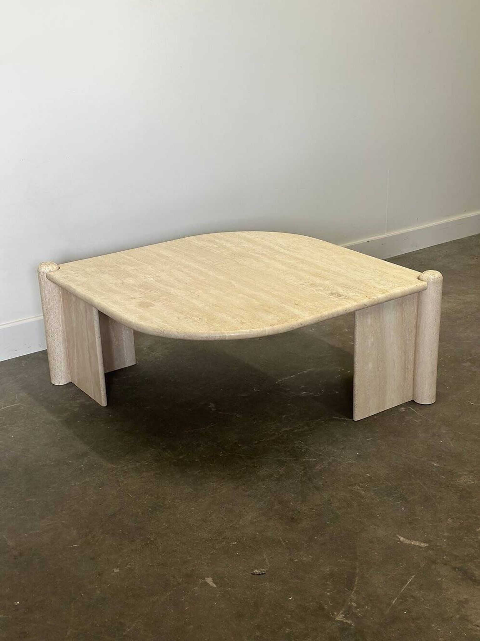 Vintage eye-shaped travertine marble coffee table, 1980s France