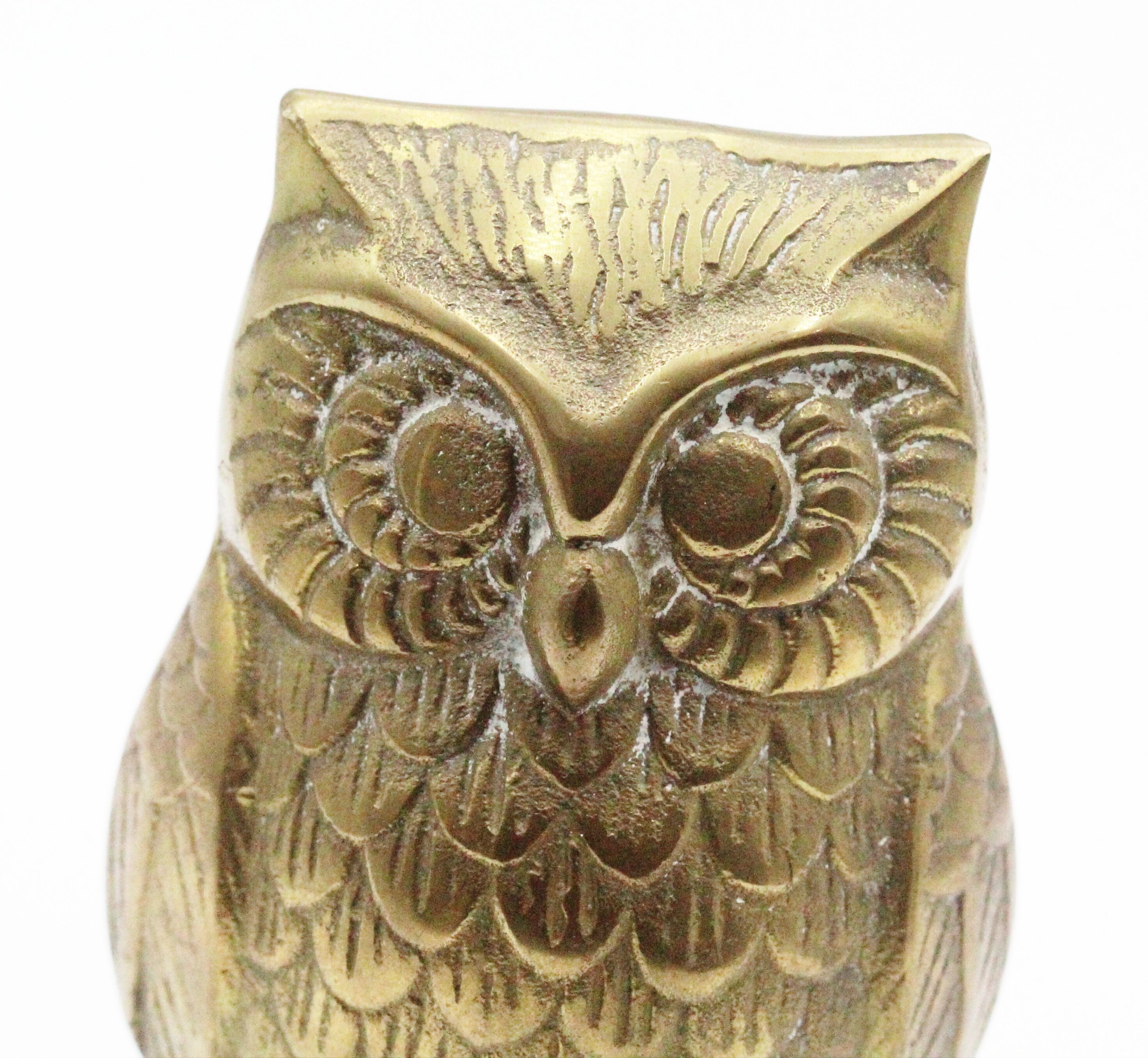Ancient brass owl statue