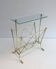 Neoclassical style magazine rack in brass with glass shelf by Maison Jansen