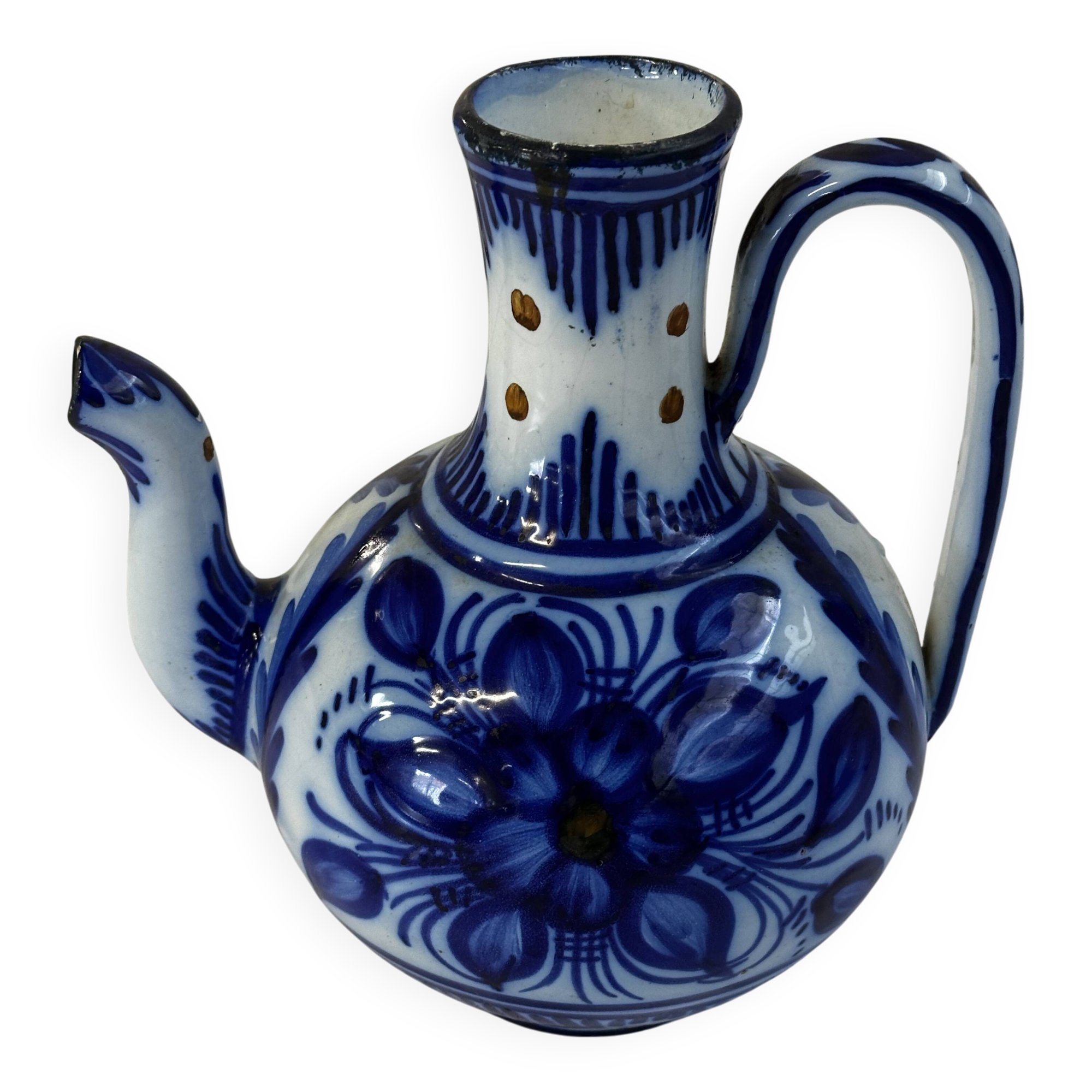 Glazed ceramic carafe with floral decoration