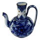 Glazed ceramic carafe with floral decoration