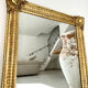 Mirror from the Restoration period, antique gilded, 19th century.